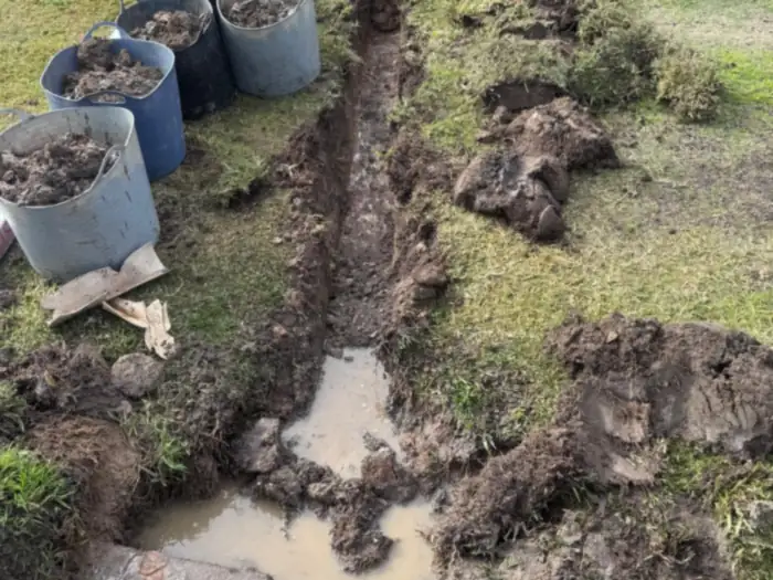 The old stormwater line dug out across the front lawn, ready for the upgrade to steel pipe